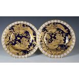 A pair of Royal Crown Derby cobalt blue ground Gold Aves pattern dinner plates, circa 1977, diameter