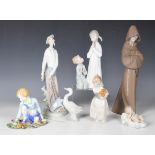 Four Lladro figures, comprising a standing Don Quixote, No. 4854 (sword blade present but detached),