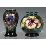 Two miniature Moorcroft pottery vases, second half 20th century, the first of baluster shape,