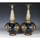 A large pair of Royal Doulton stoneware bottle vases, early 20th century, the bulbous bodies