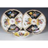 A pair of Meissen porcelain plates, late 19th century, outside painted with black ground floral