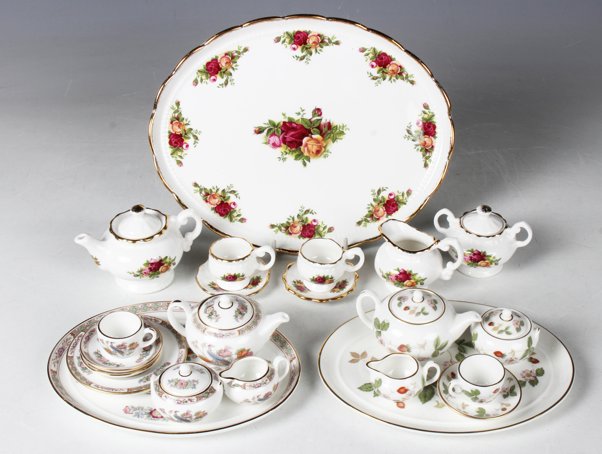 A Royal Albert Old Country Roses pattern miniature tea-for-two, comprising oval tray, length 22.5cm,