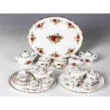A Royal Albert Old Country Roses pattern miniature tea-for-two, comprising oval tray, length 22.5cm,