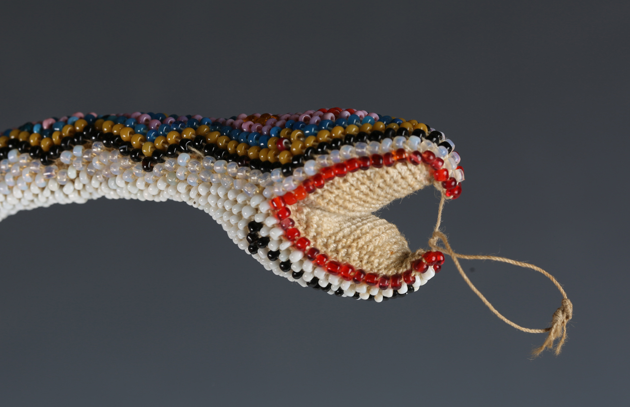 An early 20th century Turkish prisoner-of-war beadwork model of a snake, dated '1917', length - Image 2 of 3