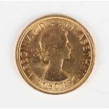 An Elizabeth II sovereign 1962.Buyer’s Premium 29.4% (including VAT @ 20%) of the hammer price. Lots