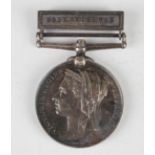 A North West Canada Medal 1885 with bar 'Saskatchewan', with engraved naming in capitals 'Pte J.
