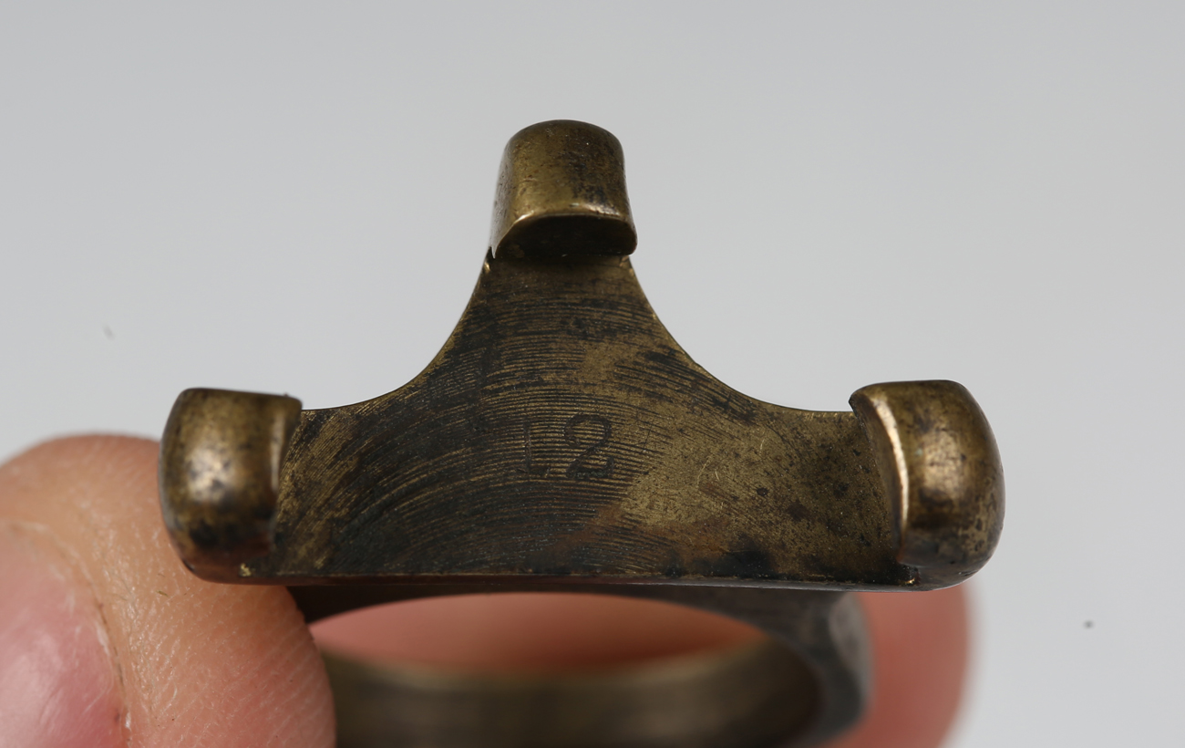 A 19th century steel mounted brass cap dispenser by S. Allport, detailed 'Improved', of circular - Image 2 of 6