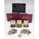 A group of pre-1947 British coinage, including half-crowns, florins, shillings and sixpences,