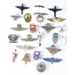 A large collection of mid to late 20th century world airborne forces and association badges.Buyer’