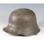 A First World War period German M16 helmet, detailed to front in white 'Gott Mit Uns' (God With Us),