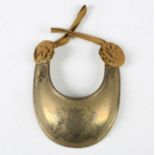 A George III gilt brass officer's gorget, the body engraved with the Royal arms, each arm with