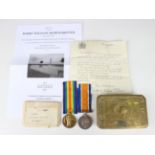A 1914-18 British War Medal and a 1914-19 Victory Medal to 'G-69138 Pte.H.W.A.Britten. The Queen's