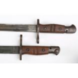 Two First World War period M1917 pattern Remington bayonets, one dated '1918', the other '1917'