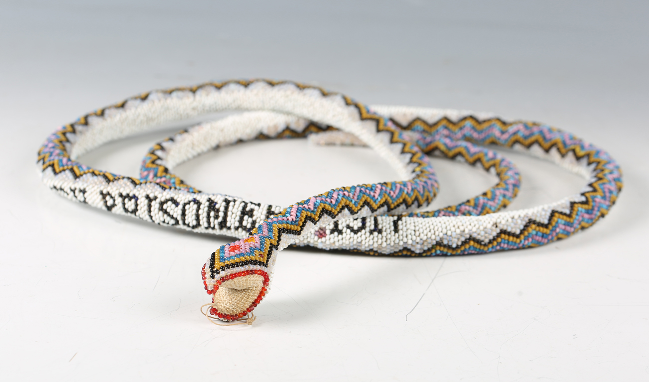 An early 20th century Turkish prisoner-of-war beadwork model of a snake, dated '1917', length