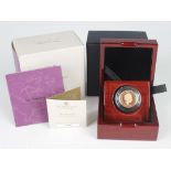 An Elizabeth II Royal Mint proof sovereign 2021, within a deluxe case.Buyer’s Premium 29.4% (