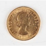 An Elizabeth II sovereign 1964.Buyer’s Premium 29.4% (including VAT @ 20%) of the hammer price. Lots