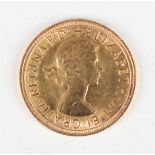 An Elizabeth II sovereign 1962.Buyer’s Premium 29.4% (including VAT @ 20%) of the hammer price. Lots