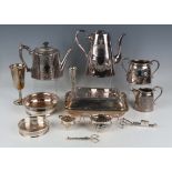 A late Victorian silver oval half spiral reeded two-handled sugar bowl and matching milk jug,