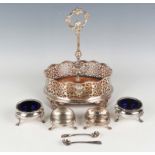 A pair of George II silver circular salts, each with a ropetwist rim, raised on stepped shouldered