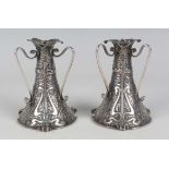 A pair of Art Nouveau silver posy vases, each of tapered cylindrical form with a triform rim above