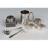 An Edwardian silver christening tankard of cylindrical tapering form with loop handle, engraved with