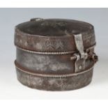 A Nuremberg style patinated steel circular casket, possibly 17th century, the hinged lid and sides