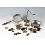 A group of 19th century and later magnifying lenses, including a brass adjustable bullseye lens,