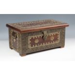 A small Zanzibar hardwood and copper mounted box with brass studded borders, width 36cm.Buyer’s