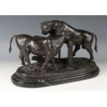 After Pierre-Jules Mêne - a modern brown patinated cast bronze model of two cows standing by a