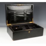 A late Victorian black leather writing box by 'P & F Schafer... London', the lid with brass recessed