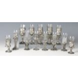 A group of fourteen modern Royal Selanger pewter novelty drinking goblets, modelled as characters