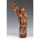 A mid-20th century Chinese carved hardwood figure of Shoulao, modelled holding a peach, height 55.