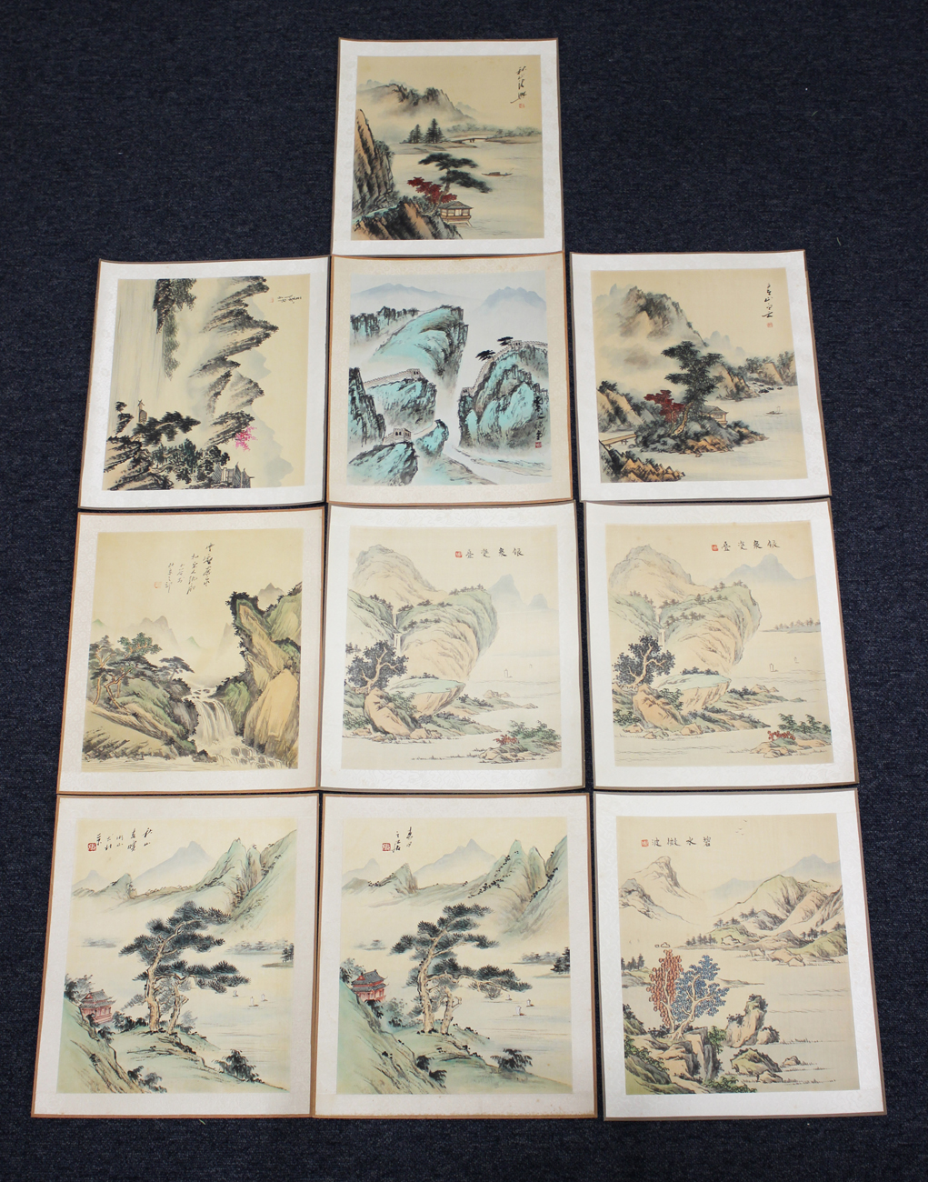 A collection of forty Chinese watercolour paintings, mid to late 20th century, depicting landscape