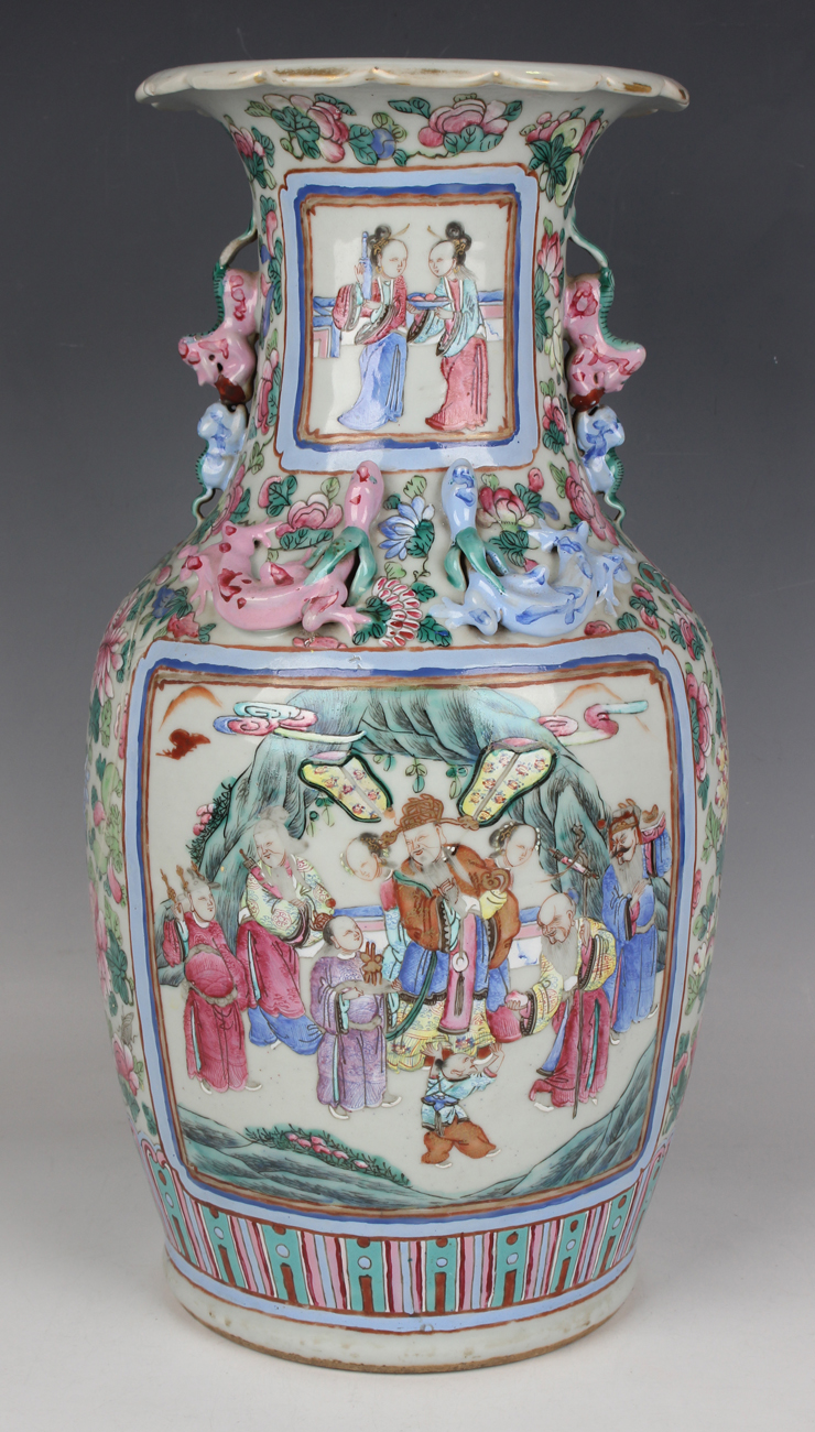 A Chinese famille rose porcelain vase, mid-19th century, the shouldered ovoid body and flared neck