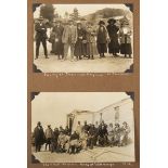 PHOTOGRAPHS. An album containing 16 postcards and approximately 189 photographs mainly of