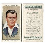 A collection of cigarette and trade cards in an album and loose, including a set of 50 Players '