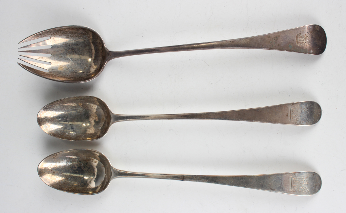 A pair of George III silver Old English pattern serving spoons, London, date letter indistinct, by