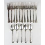 A set of six George III silver Old English pattern table forks, crest engraved, London 1801, and
