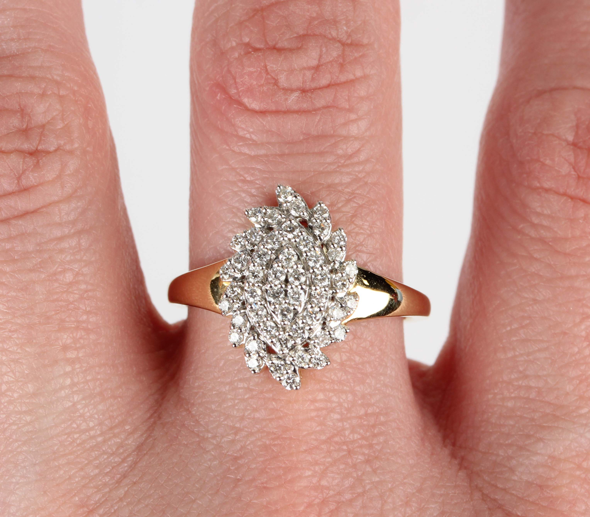 A Tomas Rae 18ct gold and diamond ring in a spiral oval cluster design, mounted with circular cut - Image 3 of 6