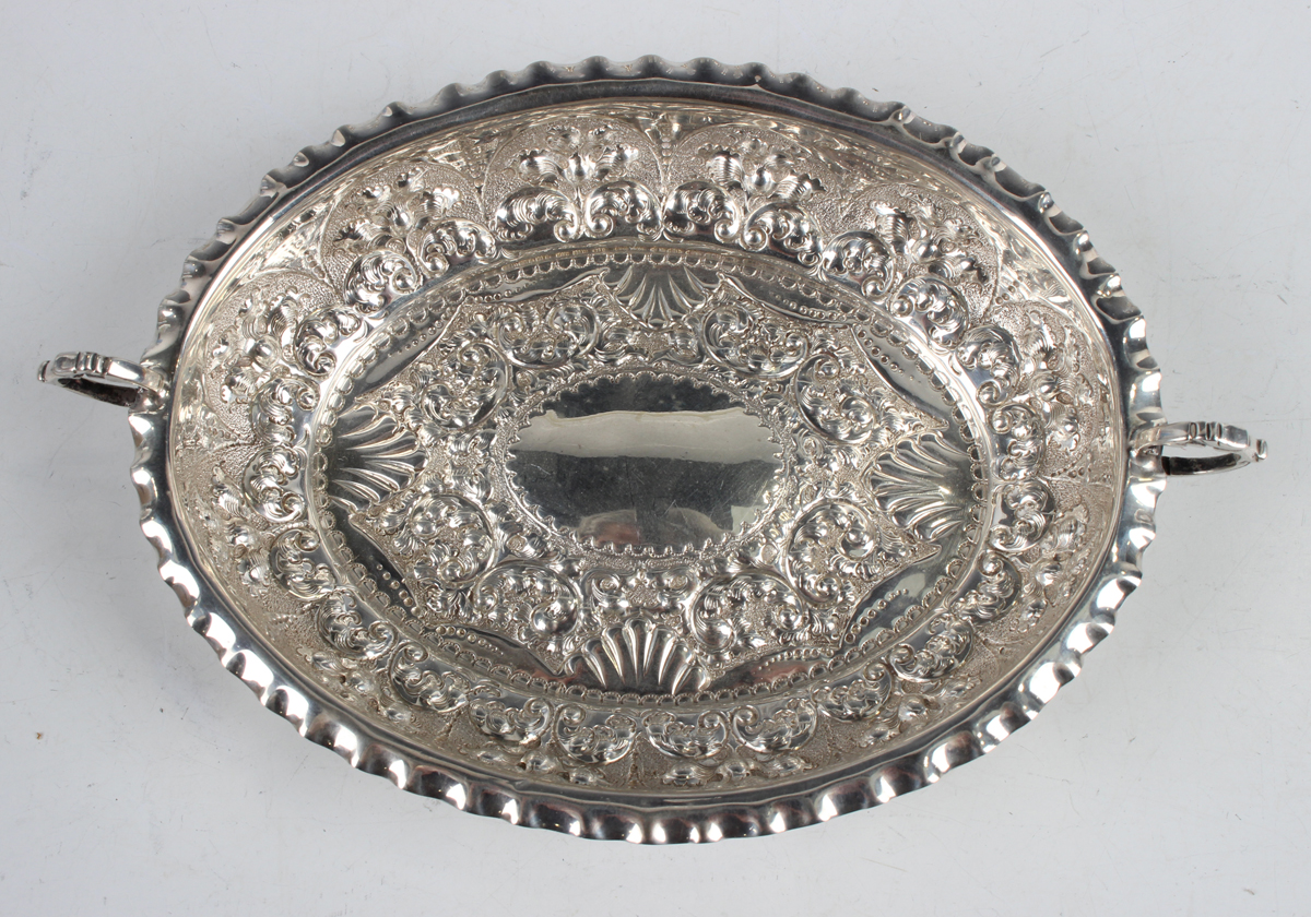 A late Victorian silver oval two-handled dish, embossed with scrolls, Sheffield 1891, weight 72g, - Image 7 of 7