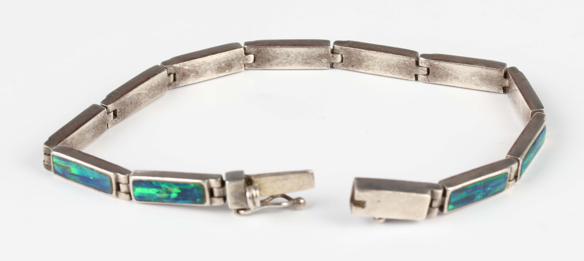 A sterling silver and opal bracelet with a snap clasp, detailed 'Sterling', weight 14.5g, length - Image 2 of 2