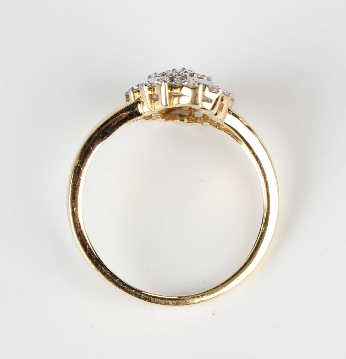 A Tomas Rae 18ct gold and diamond ring in a spiral oval cluster design, mounted with circular cut - Image 4 of 6