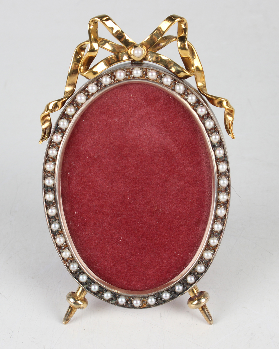 A Sarah Fabergé St Petersburg Collection silver and pearl mounted photograph frame of oval form with - Image 7 of 7