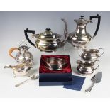 An Elizabeth II silver sauceboat with flying scroll handle and gadrooned rim, on scroll legs,