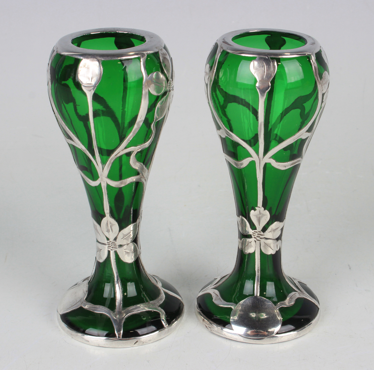A pair of early 20th century silver overlaid green glass vases, each of slender baluster form, - Image 2 of 3