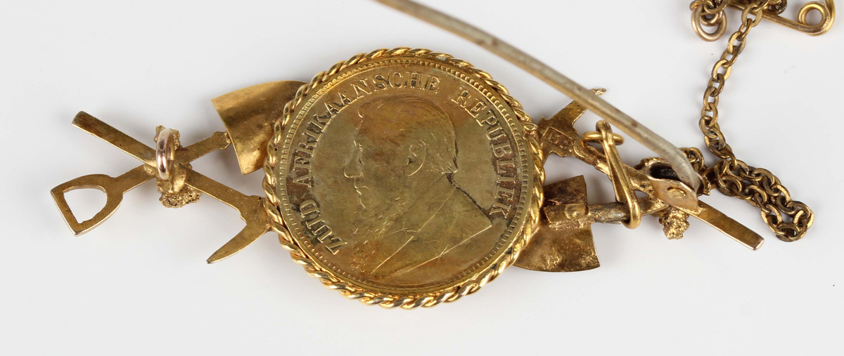 A South African 'gold prospector' brooch, the centre mounted with a half-pond 1896, the sides with - Image 2 of 2