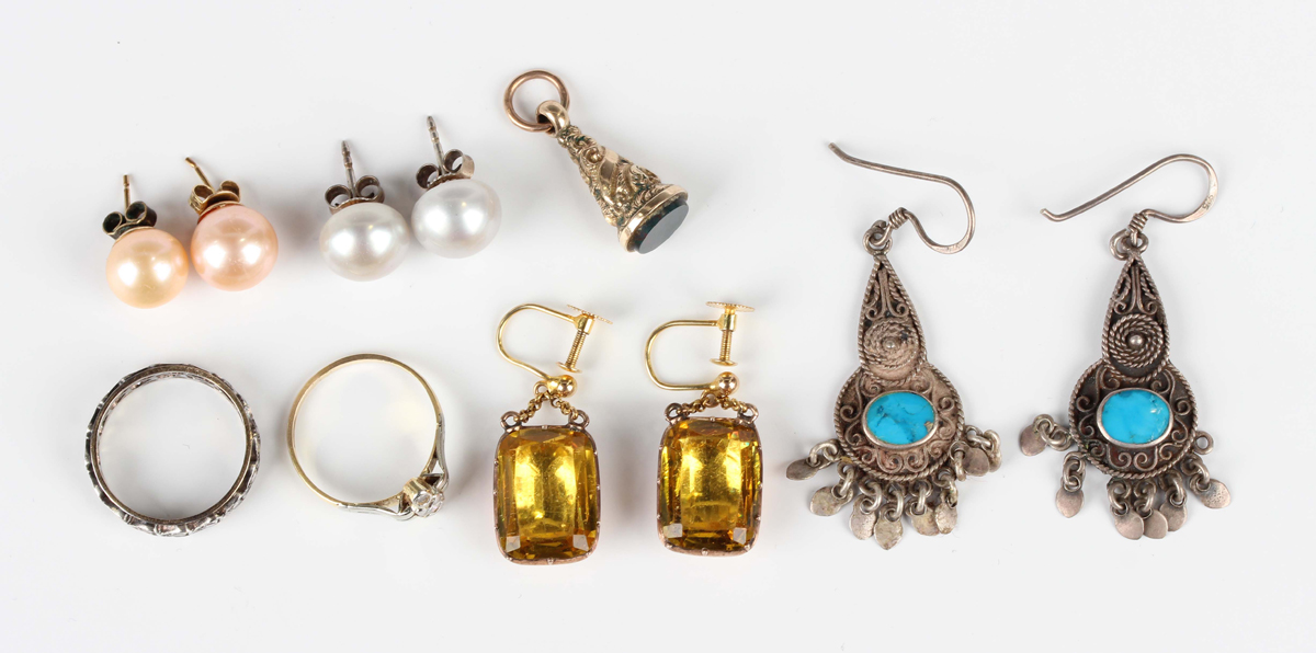 A pair of gold mounted foil backed yellow paste pendant earrings, the later screw fittings