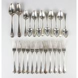 A George III part canteen of silver Old English pattern cutlery, crest engraved, comprising two