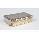 A George IV silver rectangular snuff box with overall engine turned decoration, the hinged lid