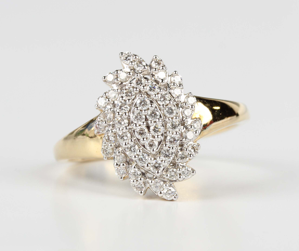 A Tomas Rae 18ct gold and diamond ring in a spiral oval cluster design, mounted with circular cut - Image 6 of 6